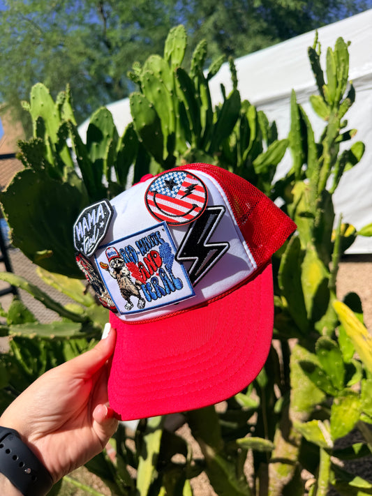 Red, white, and feral-colored hat by High Desert Hats featuring a stylish, casual design with a curved brim and adjustable strap.