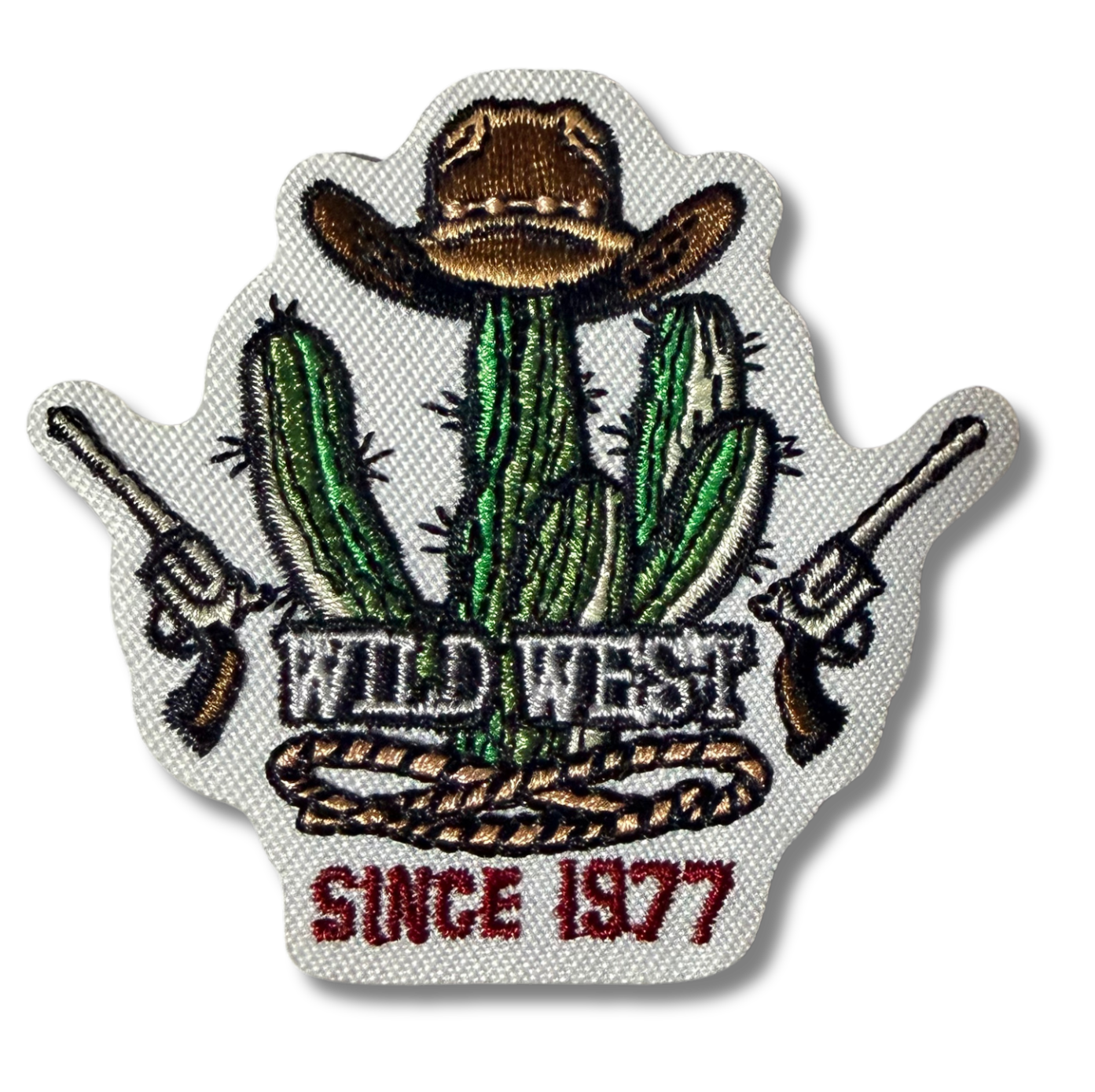 Wild West embroidered patch by High Desert Hats featuring detailed western-themed design on fabric background.