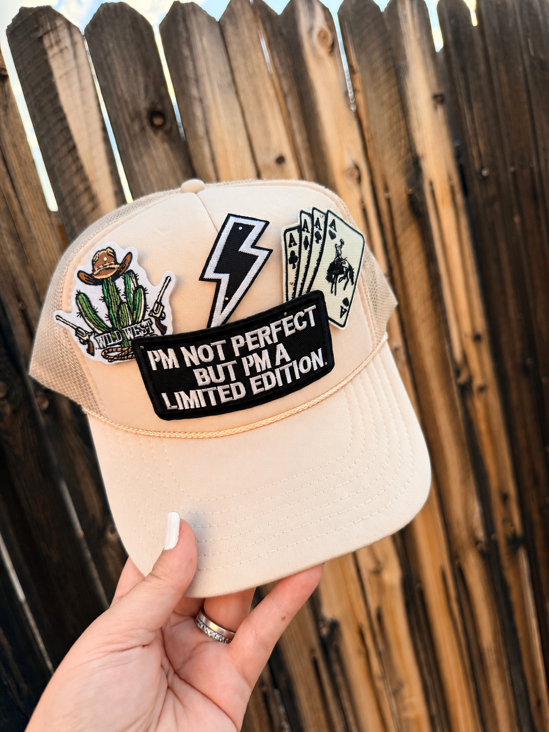 Limited edition trucker hat by High Desert Hats featuring a patch with "I'm Not Perfect But I'm A Limited Edition" design.