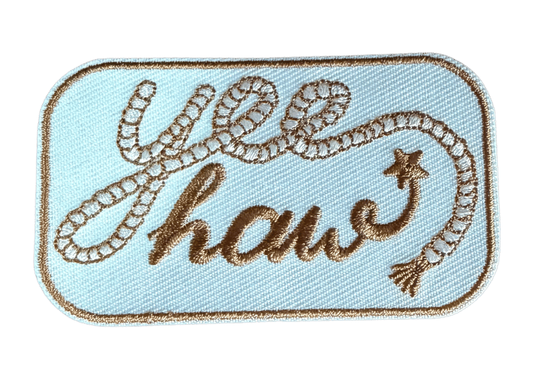 Yee Haw embroidered patch with rope-style lettering on light blue background