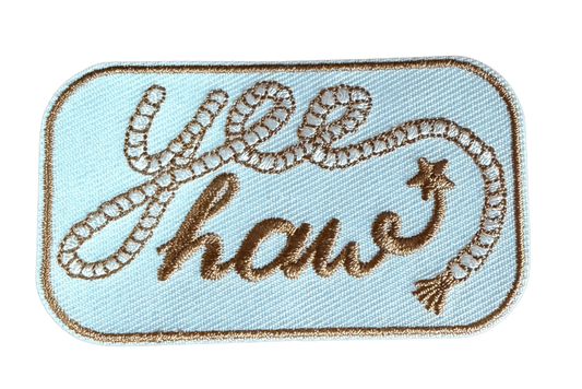 Yee Haw embroidered patch with rope-style lettering on light blue background