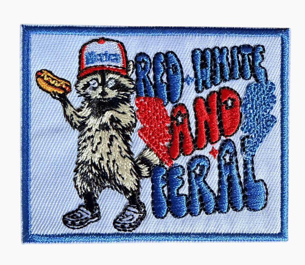 Red White and Feral embroidered patch with raccoon holding hot dog