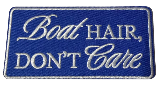 Embroidered "Boat Hair Don't Care" patch by High Desert Hats, featuring nautical-themed text and vibrant stitching on fabric.