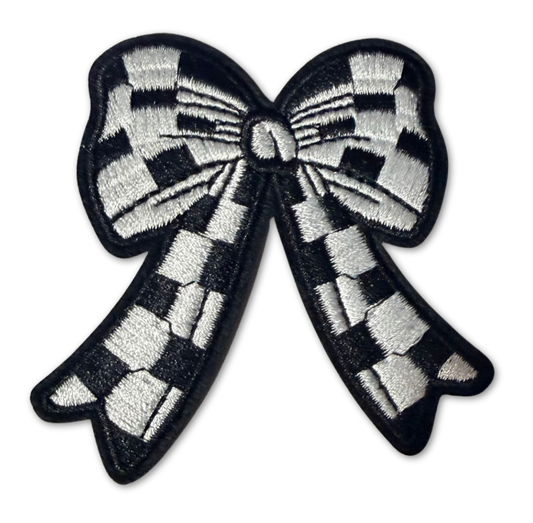 Checkered bow embroidered patch from High Desert Hats, featuring detailed stitching and vibrant checkered design.