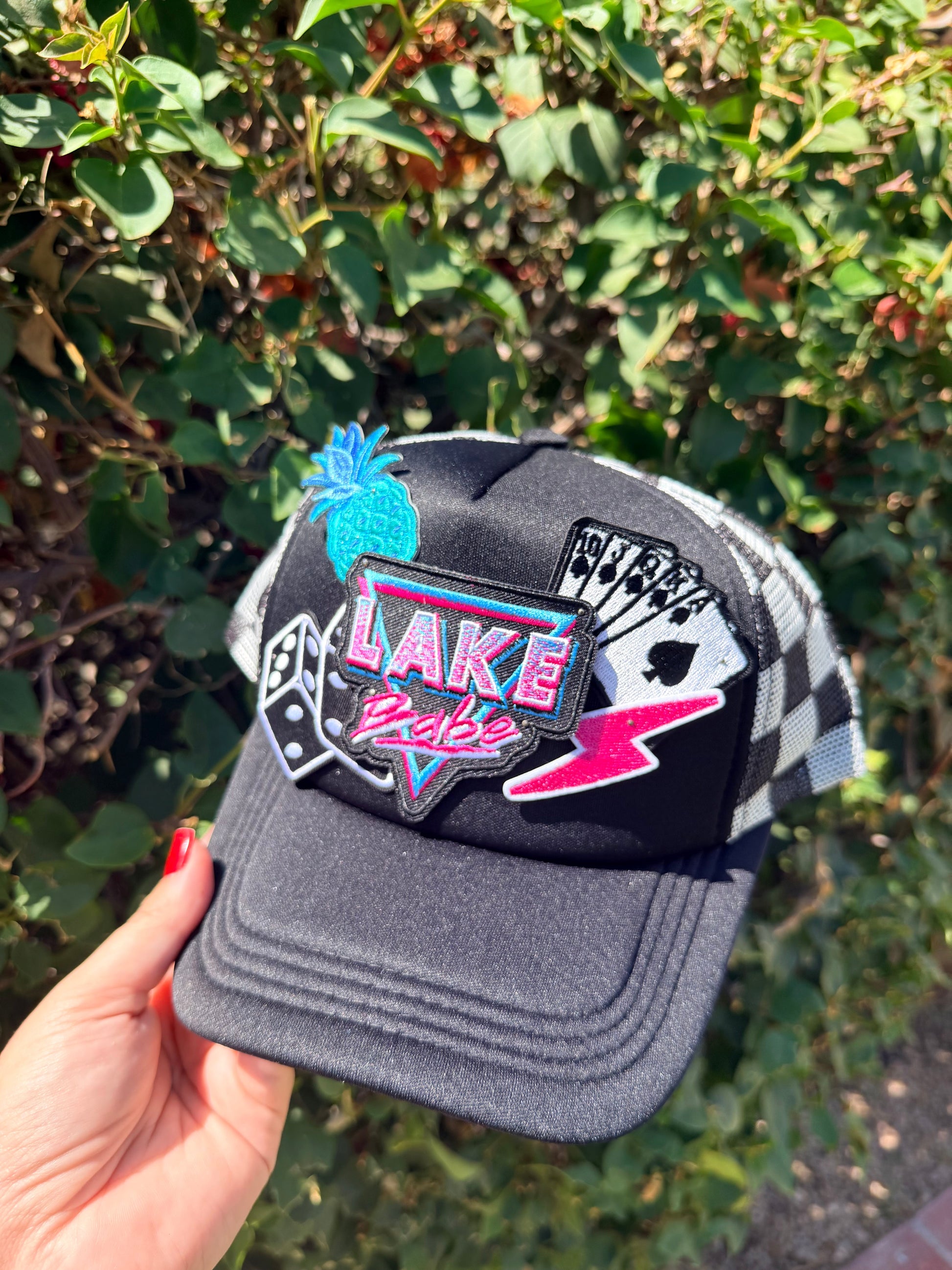 High Desert Hats Lake Babe Patch Trucker Hat featuring a colorful embroidered patch and classic mesh backing