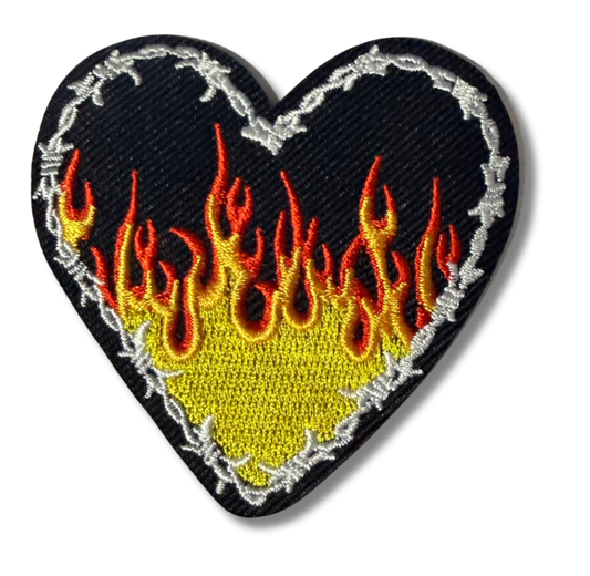 High Desert Hats flame heart embroidered patch showing vibrant flame and heart design on fabric background
