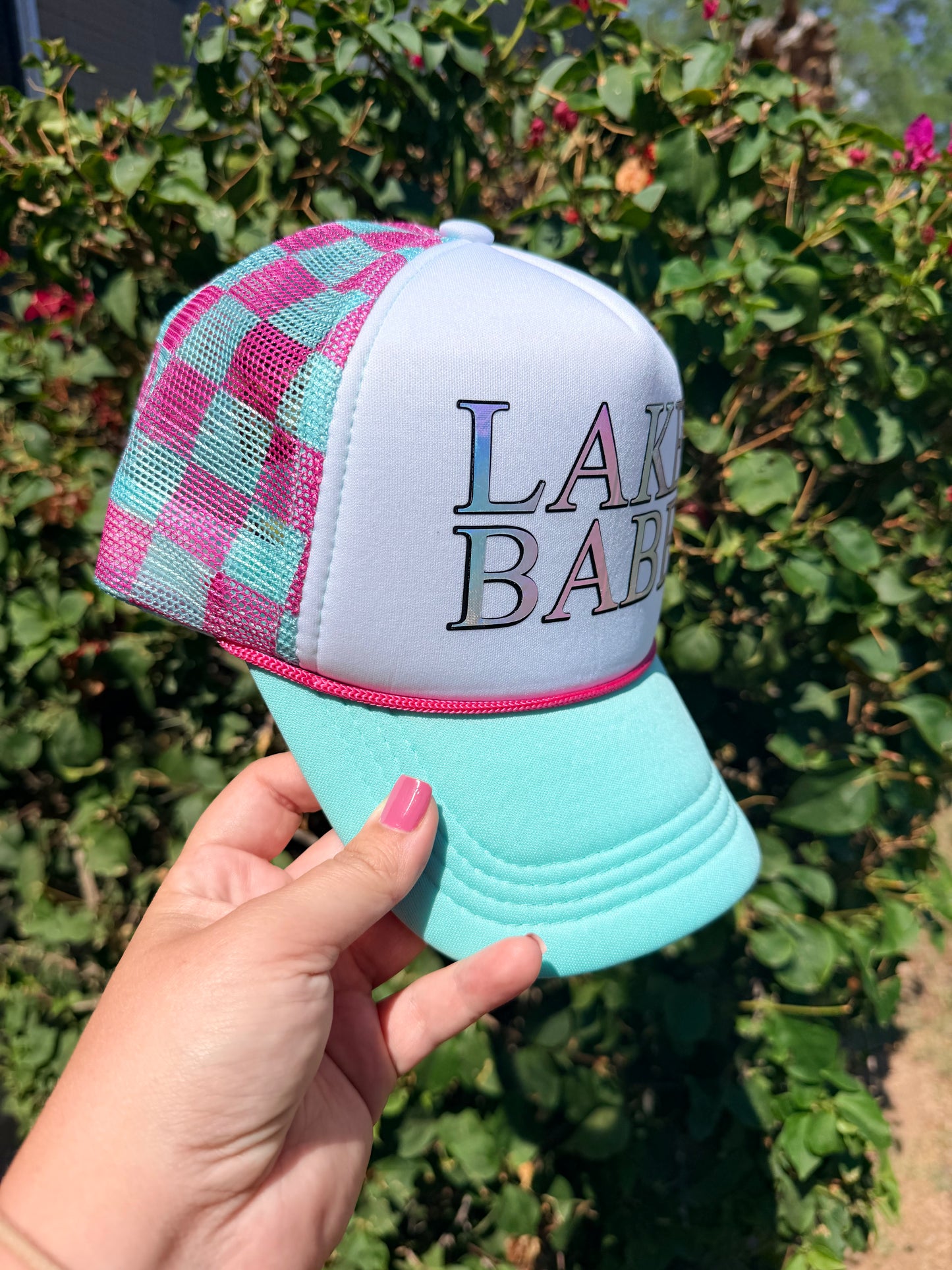 High Desert Hats Lake Babe Trucker Hat with mesh back and embroidered front logo, perfect for casual outdoor wear.