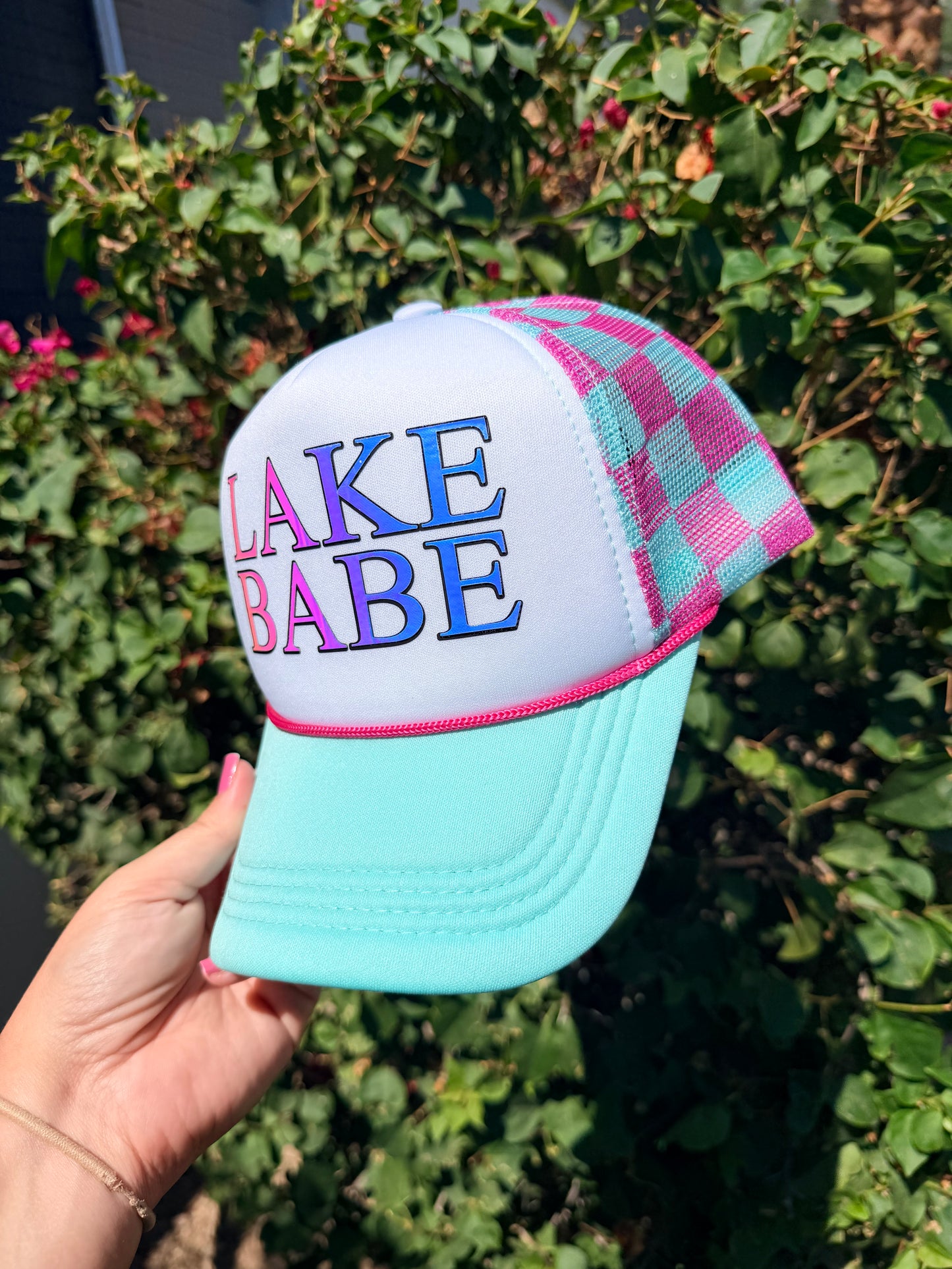 High Desert Hats Lake Babe Trucker Hat with mesh back and embroidered front panel, featuring a casual, outdoors-inspired design.