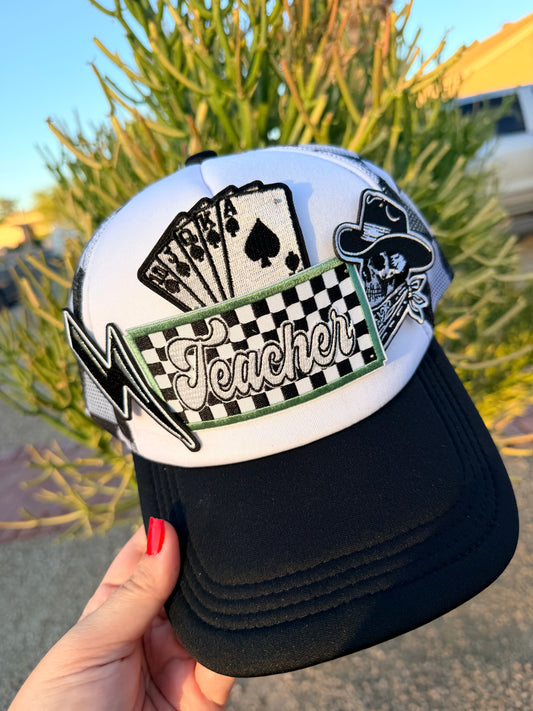 High Desert Hats Teacher Outlaw premade trucker hat with embroidered design, adjustable snapback, and classic mesh back for casual style