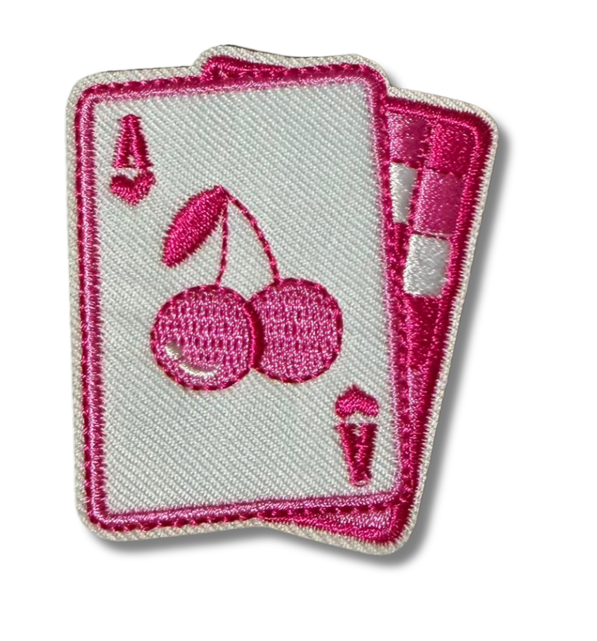 Pink cherry checkered embroidered patch from High Desert Hats featuring detailed stitching and vibrant colors.