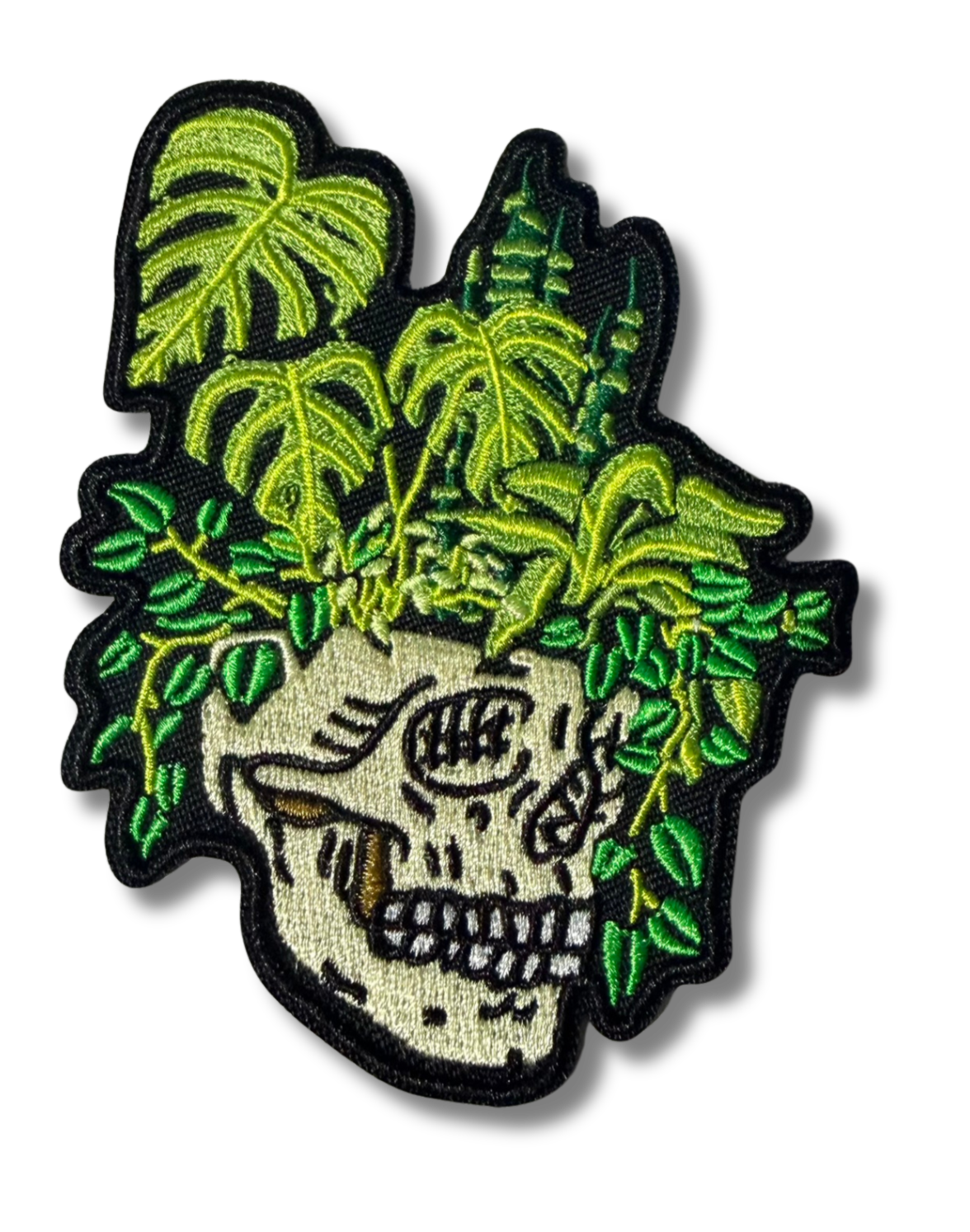 High Desert Hats plant skull embroidered patch showing detailed green and brown plant and skull design on fabric background