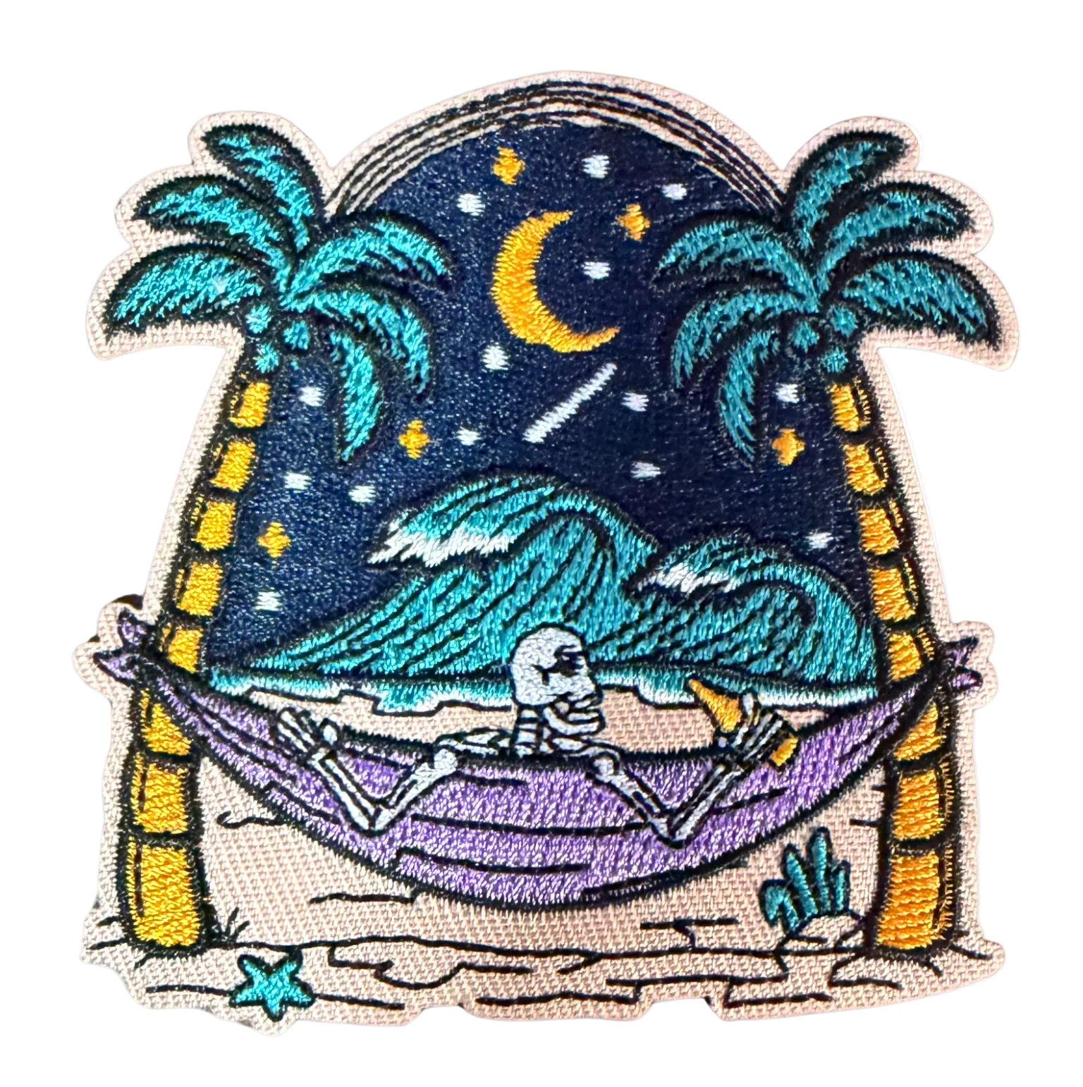 Skeleton in hammock between palm trees under starry night sky patch