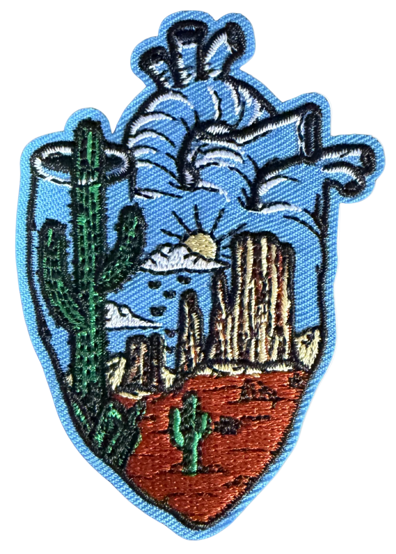 High Desert Hats Desert Arrowhead Patch featuring a detailed arrowhead design on fabric patch for clothing or accessories.