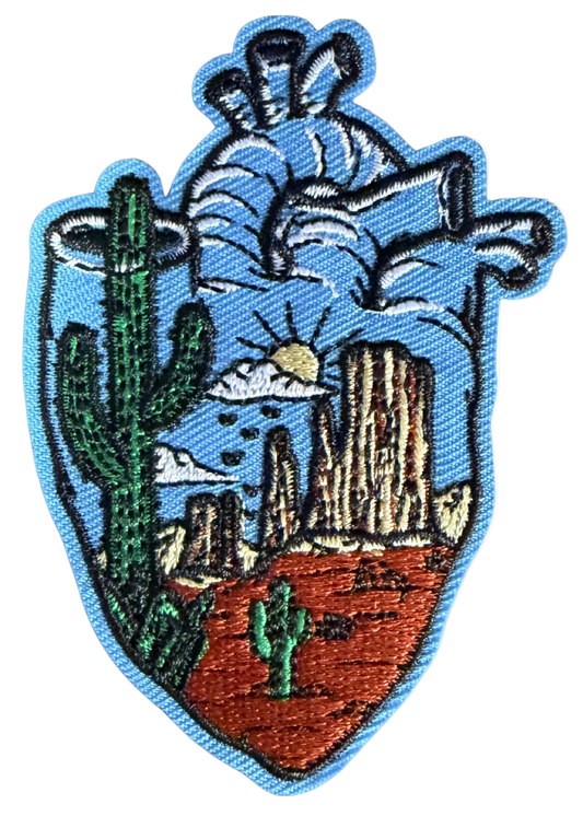 High Desert Hats Desert Arrowhead Patch featuring a detailed arrowhead design on fabric patch for clothing or accessories.